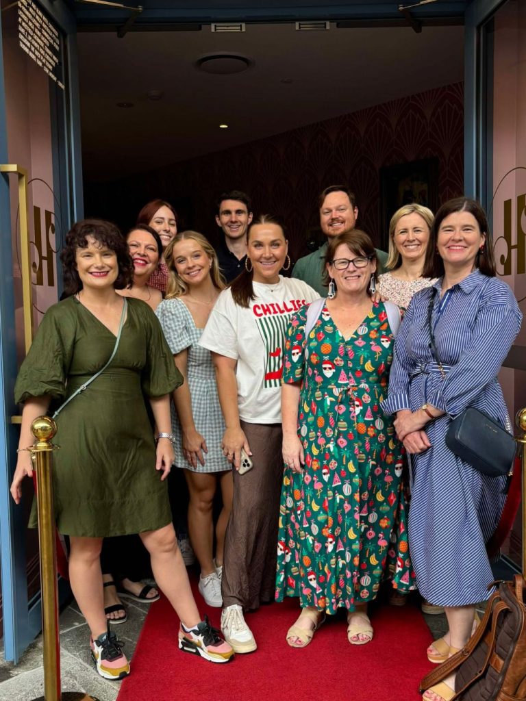 The Bespoken staff gathered, smiling